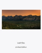 Last Kiss fine art photograph of sunlit red sandstone mountains in Red Rock Canyon, Nevada.
