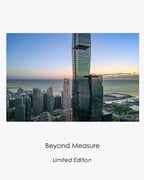 Beyond Measure fine art aerial photograph of the Chicago skyline and a glass tower rising beyond the frame at sunrise.