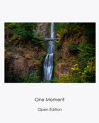 One Moment woodland fine art photograph featuring Multnomah Falls surrounded by autumn foliage.