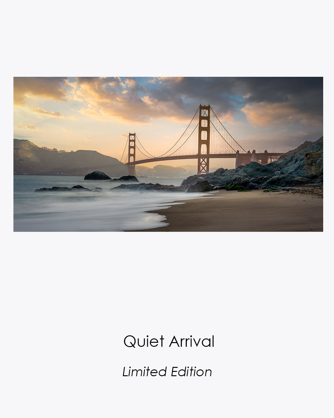 Quiet Arrival limited-edition fine art photograph of the Golden Gate Bridge glowing above Baker Beach at dawn.