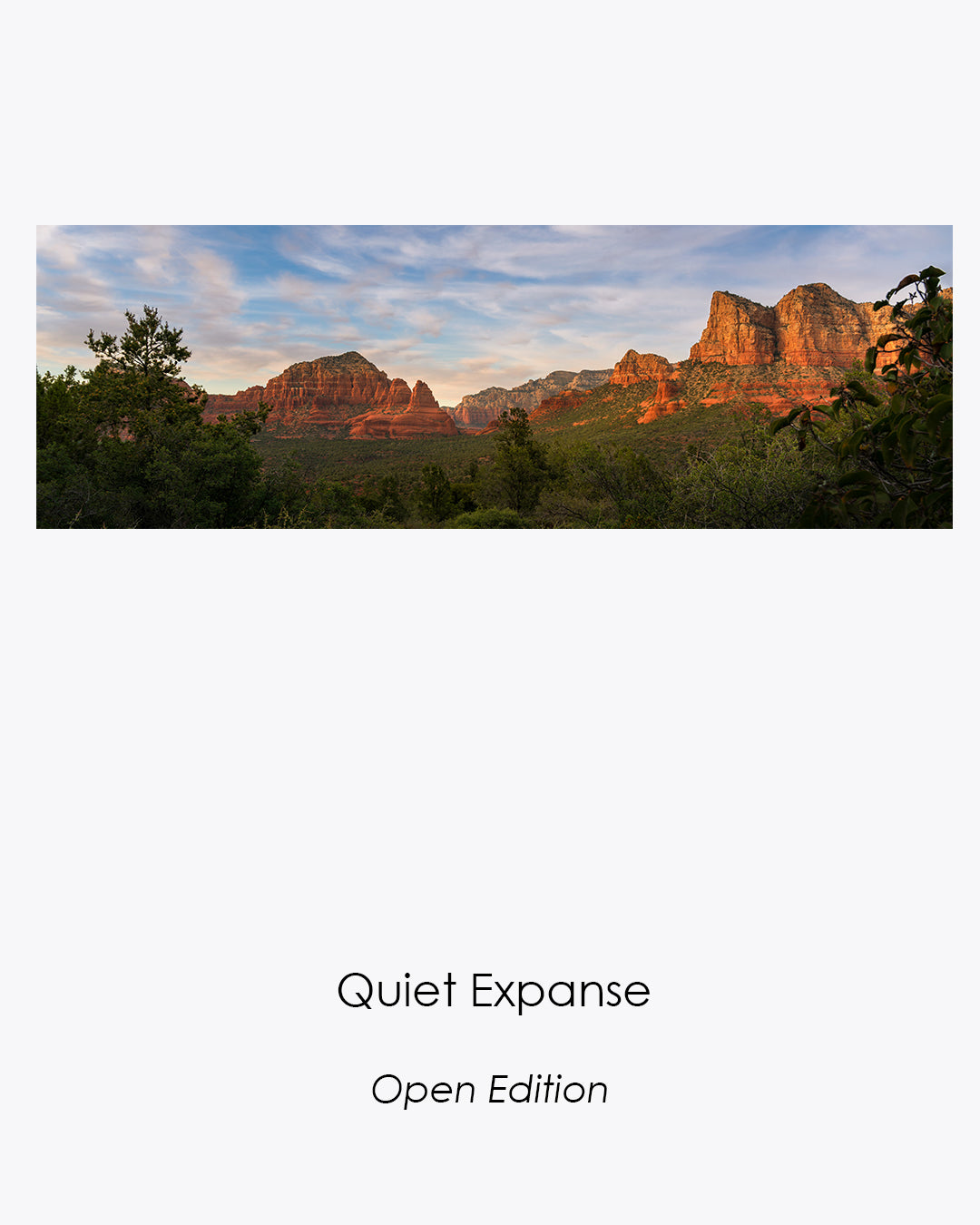 Quiet Expanse, a panoramic view of Sedona’s red rock valley glowing in the final light of day.