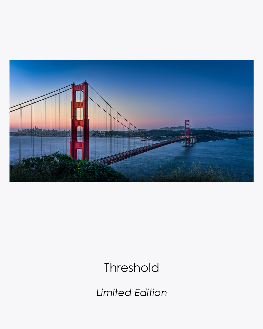 Threshold limited-edition panoramic photograph of the Golden Gate Bridge and San Francisco during blue hour.