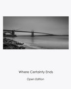 Golden Gate Bridge disappearing into morning fog in the black-and-white photograph Where Certainty Ends.