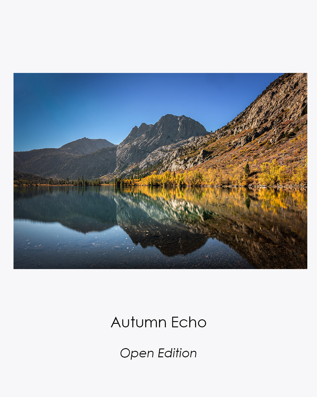 Autumn Echo — Open Edition. Golden autumn trees and mountain peaks reflected in Silver Lake, California.