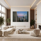 Large-scale Open Passage Chicago aerial photograph displayed above a curved white sofa in a luxurious contemporary living room.