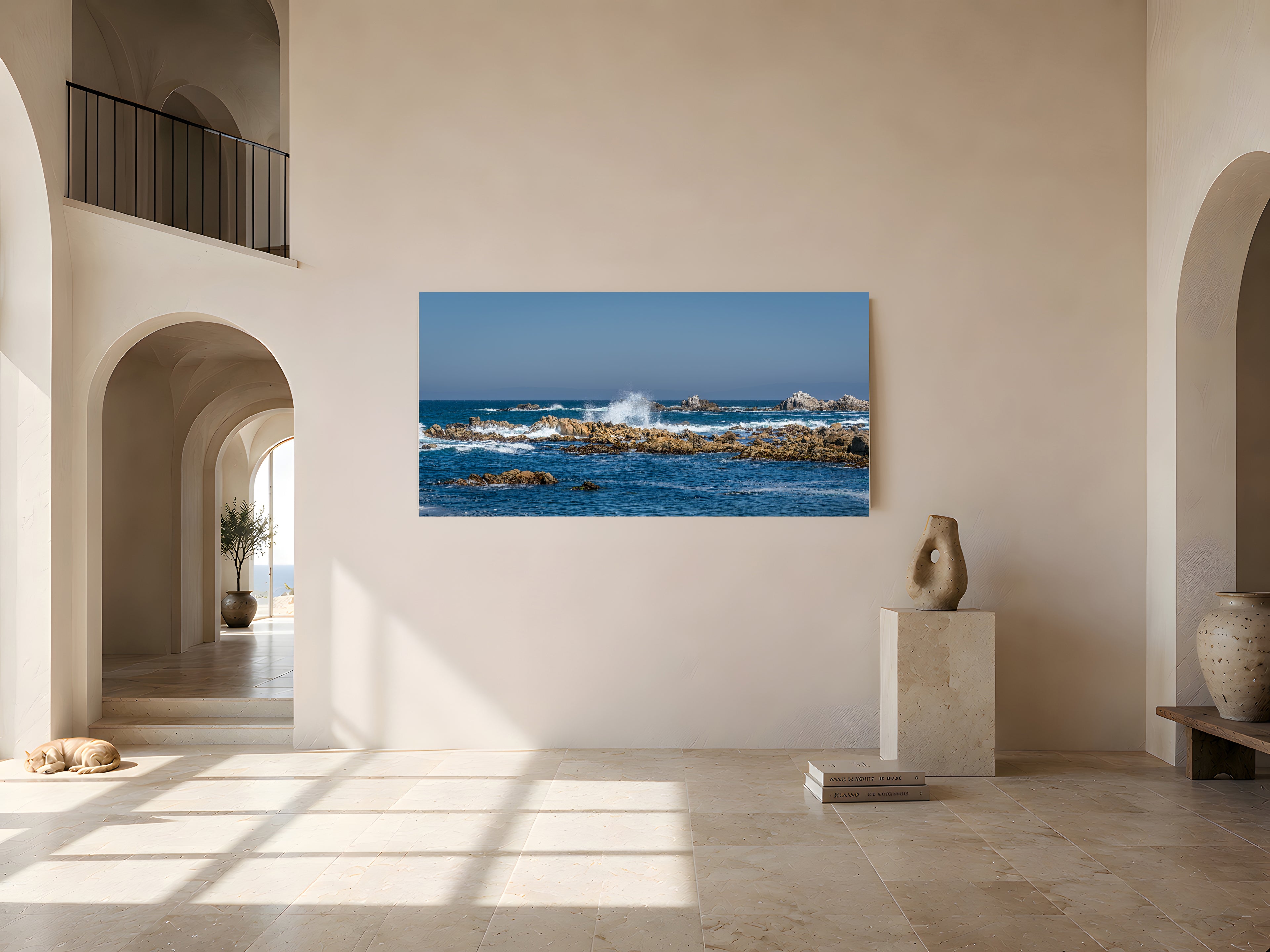 Held Motion panoramic coastal artwork displayed as a large acrylic print in an elegant, warm neutral interior.