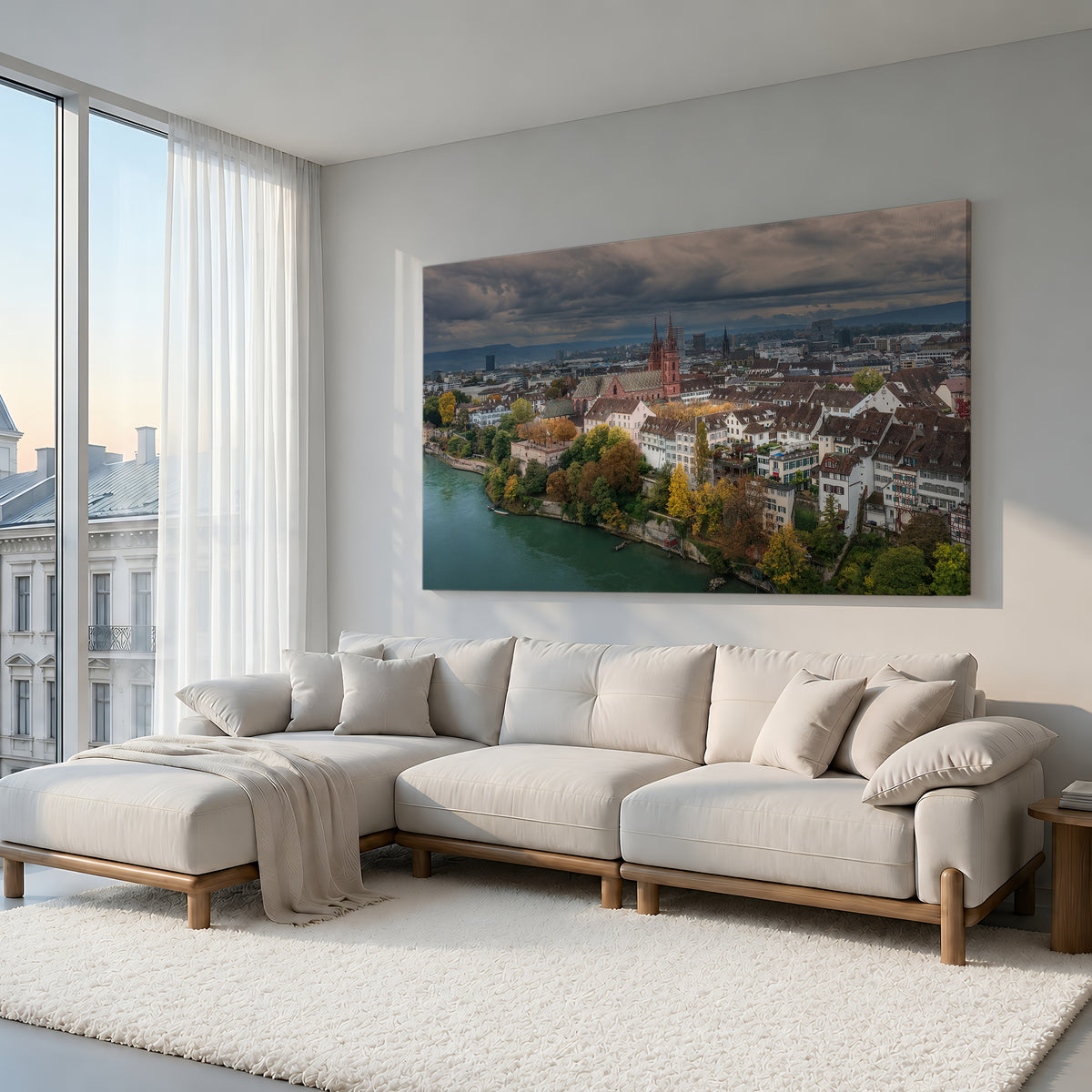 Large acrylic print of A City Held, featuring Basel and the Basler Münster, displayed above a white sofa in a bright contemporary living room.