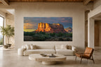 Large panoramic acrylic print of Sudden Radiance displayed above a cream sofa in a luxury contemporary Southwest living room.