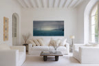 The Passage panoramic Golden Gate Bridge photograph displayed as large-scale wall art in an elegant white living room.